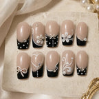 Black Bow & Blossom French Tip Press On Nails — image 2