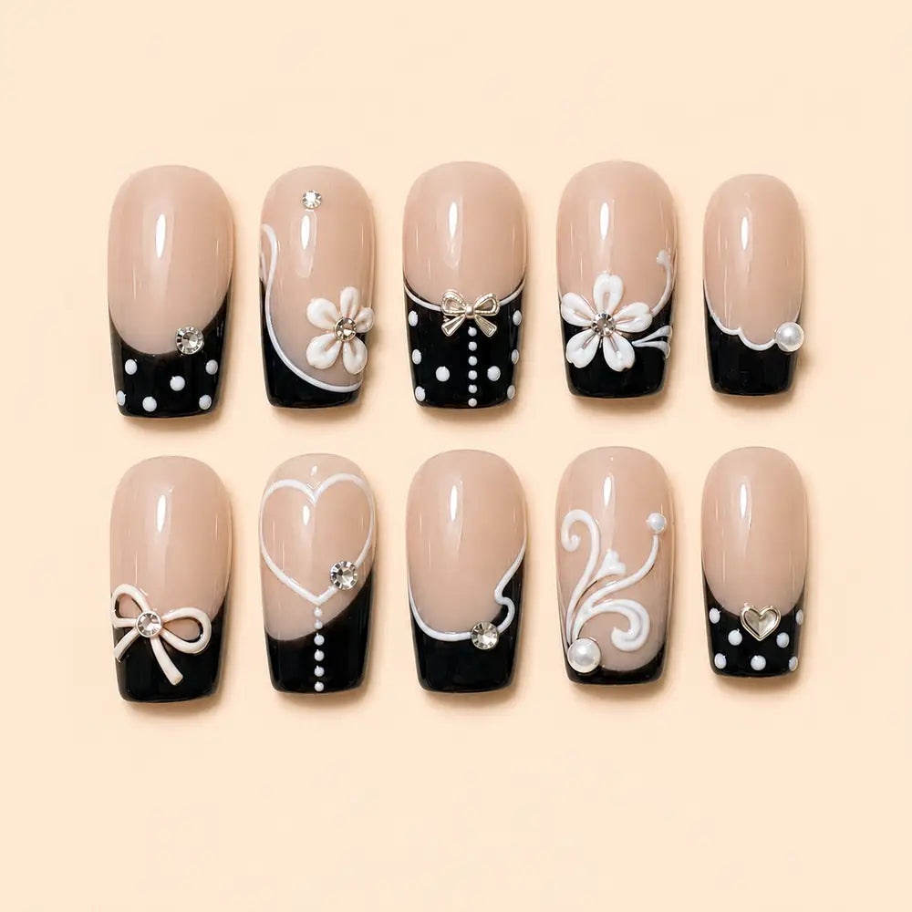 Black Bow & Blossom French Tip Press On Nails — image 1