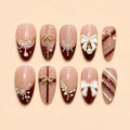 Christmas Gift Bow & Snowflake Press On Nails — image 1