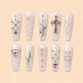 Pink Cross & Bow Rhinestone Press On Nails — image 1