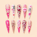 XOXO Heart & Bow Rhinestone Stiletto Press On Nails — image 1